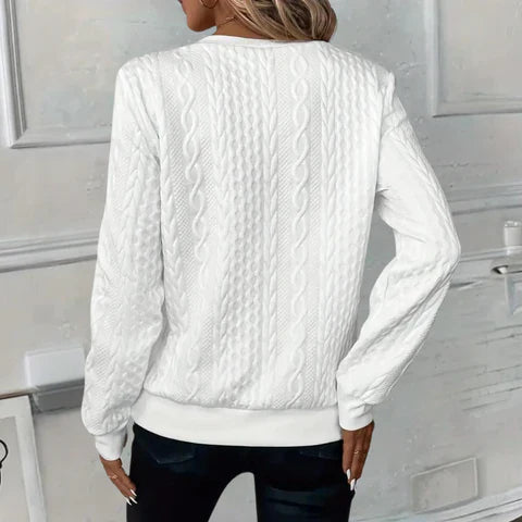Amelie | pull à col zippé en tricot torsadé